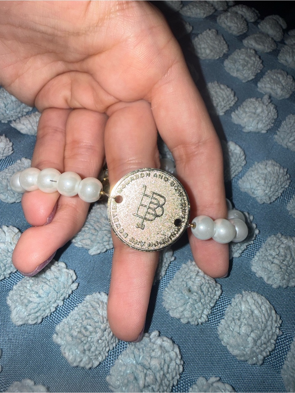 Bourbon and Bowties White Pearl Bead Ring with Silver-Tone Emblem